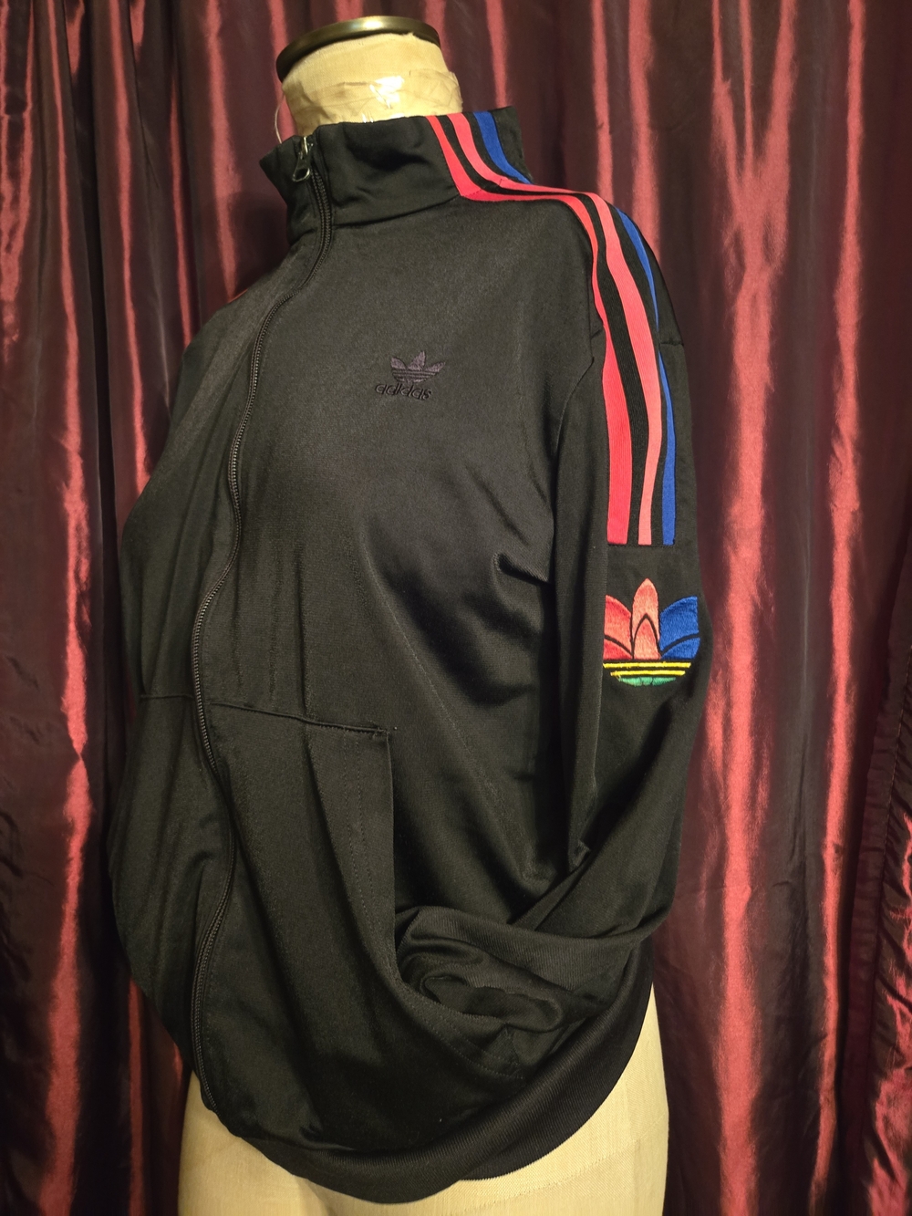 adidas black zipper pull with dark purple fabric